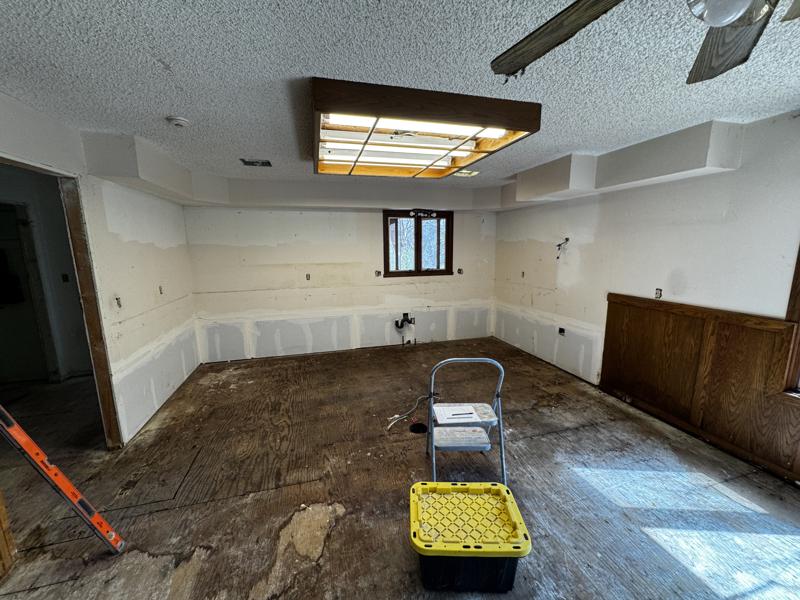 Constellation: during, kitchen cleared down to the subfloor